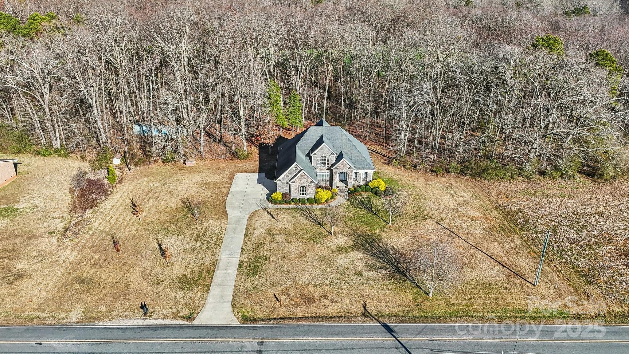 4006 Sincerity Road Monroe, NC 28110 - Photo 32 of 36 a view of roof with wooden floor