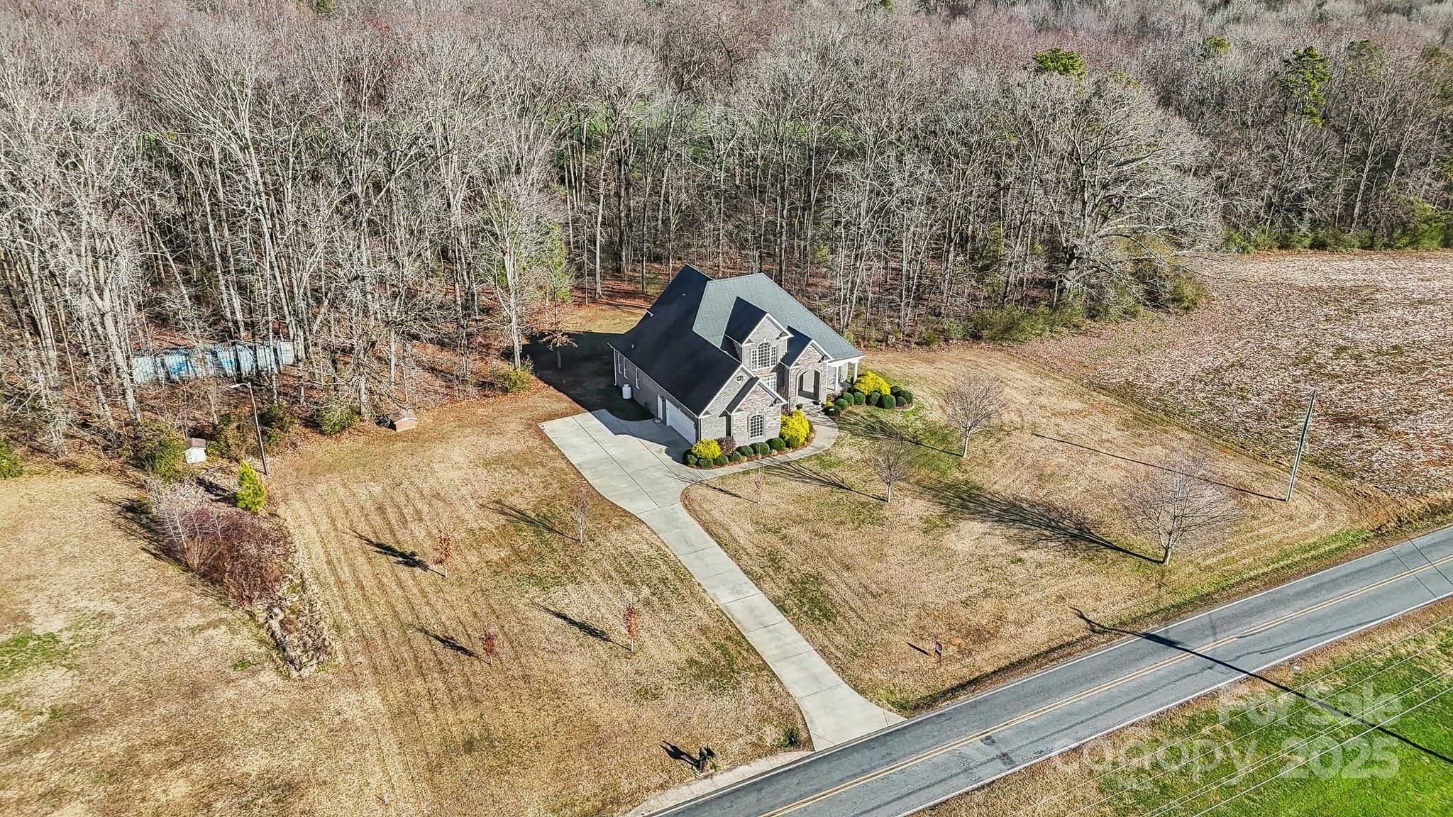 4006 Sincerity Road Monroe, NC 28110 - Photo 33 of 36 a view of a backyard of a house