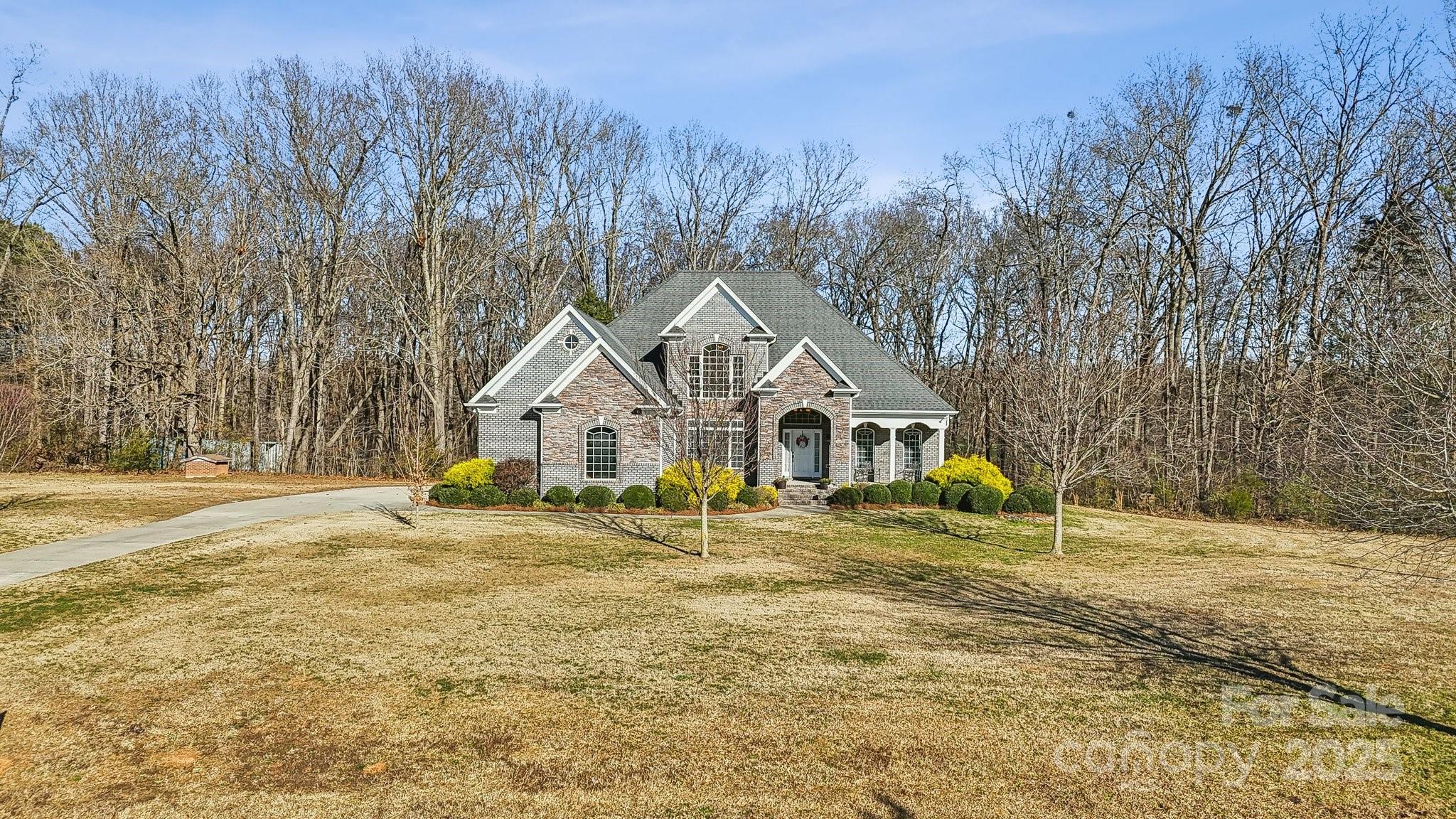 4006 Sincerity Road Monroe, NC 28110 - Photo 34 of 36 a view of a house with a yard