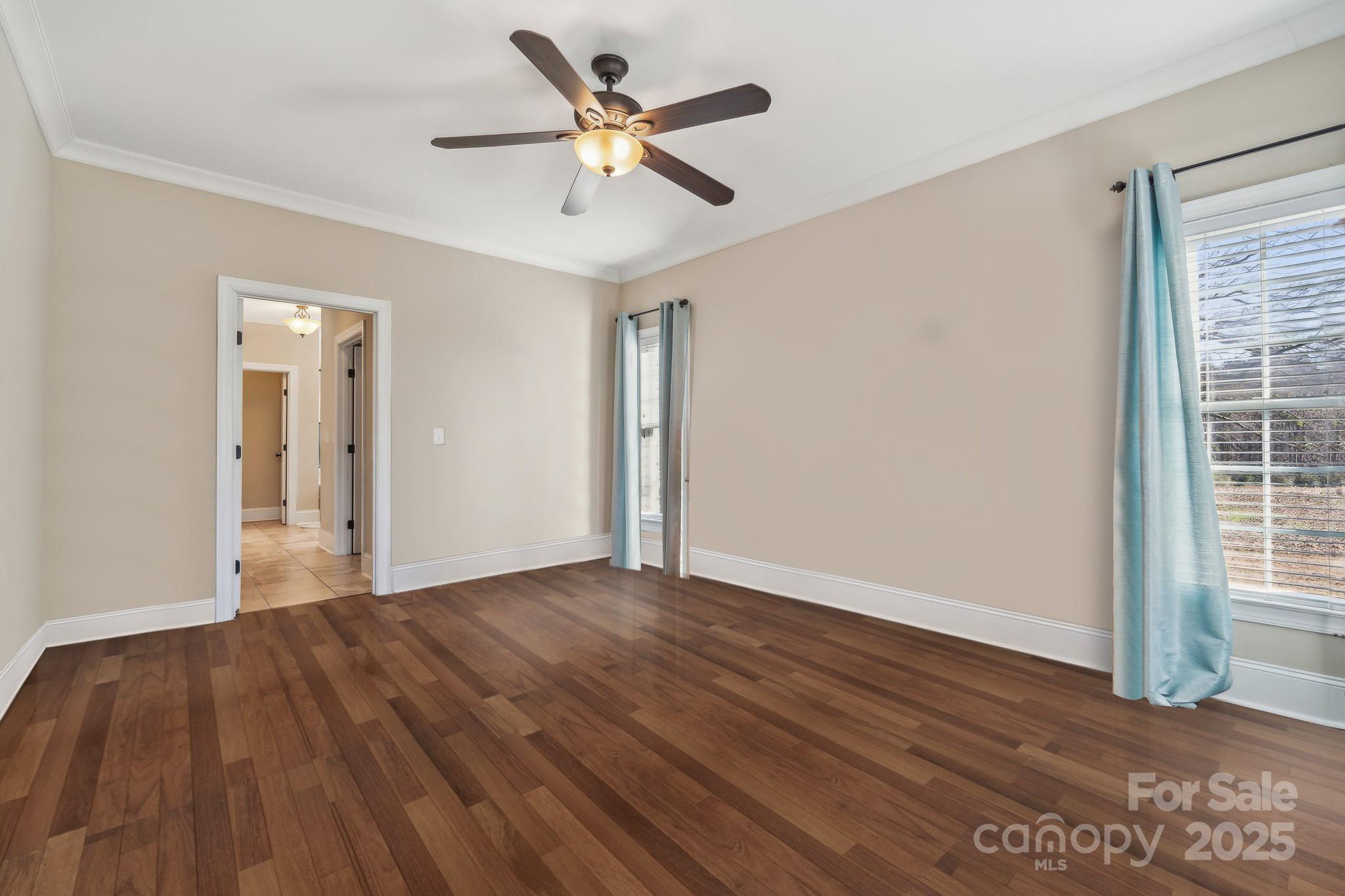 4006 Sincerity Road Monroe, NC 28110 - Photo 6 of 36 wooden floor in an empty room with a window