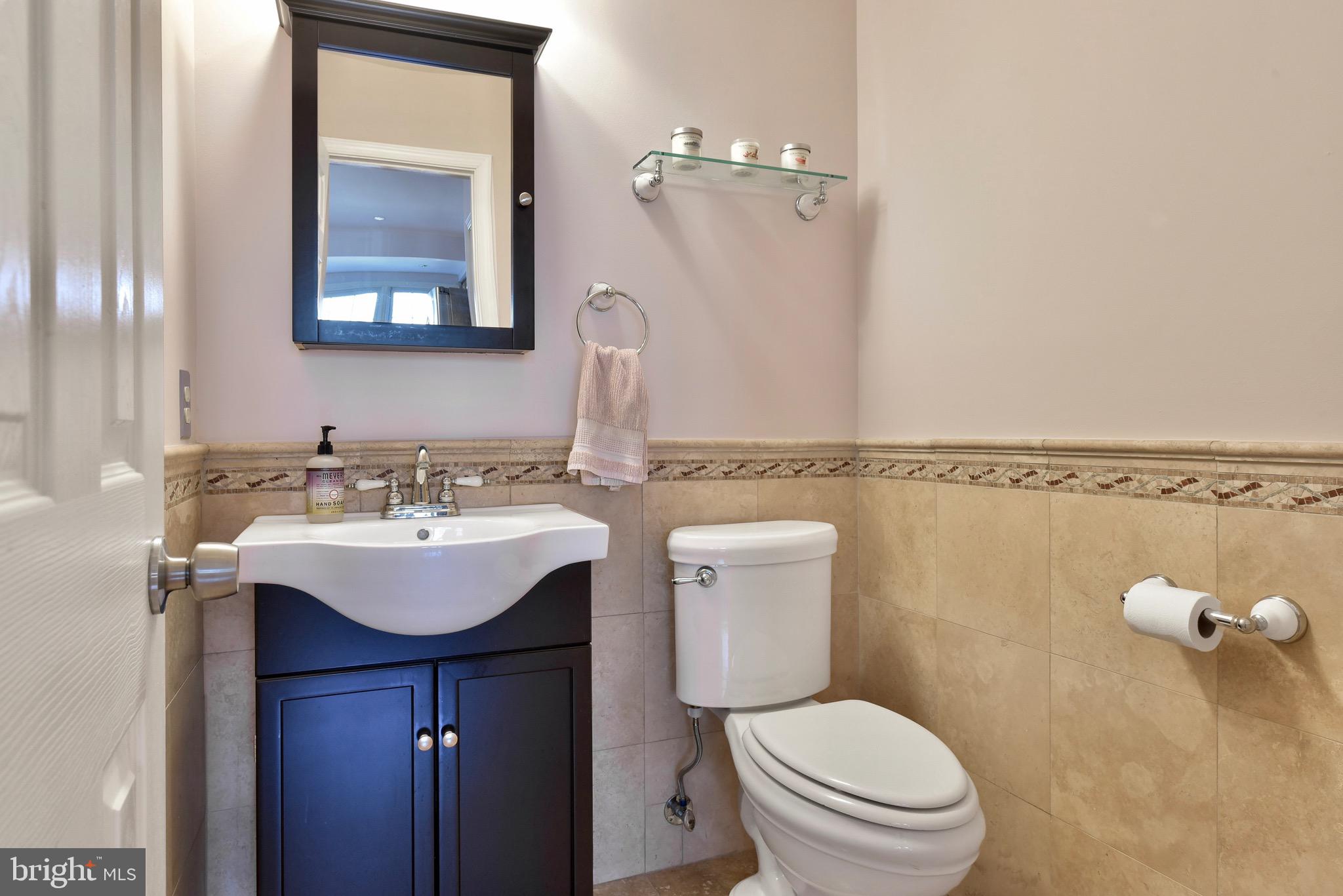 20320 Burnley Square Sterling, VA 20165 - Photo 12 of 37 Convenient powder room on the main level