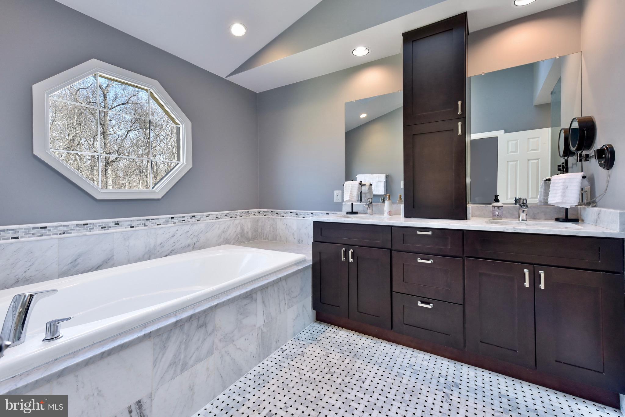 20320 Burnley Square Sterling, VA 20165 - Photo 15 of 37 The ensuite bathroom has been luxuriously updated