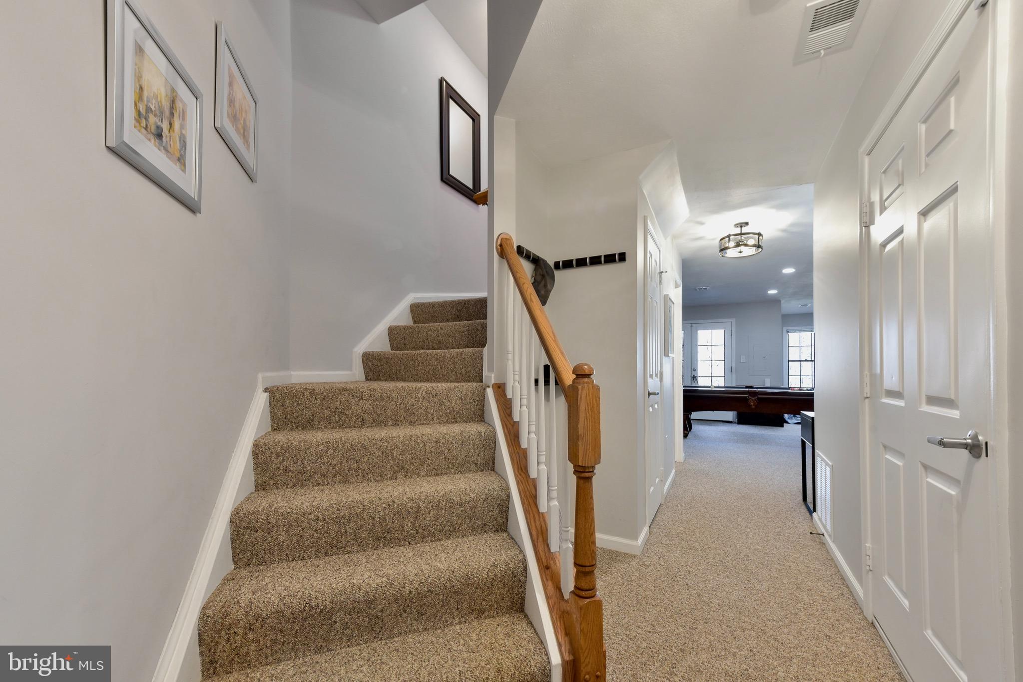 20320 Burnley Square Sterling, VA 20165 - Photo 22 of 37 Head downstairs to lower level walk-out