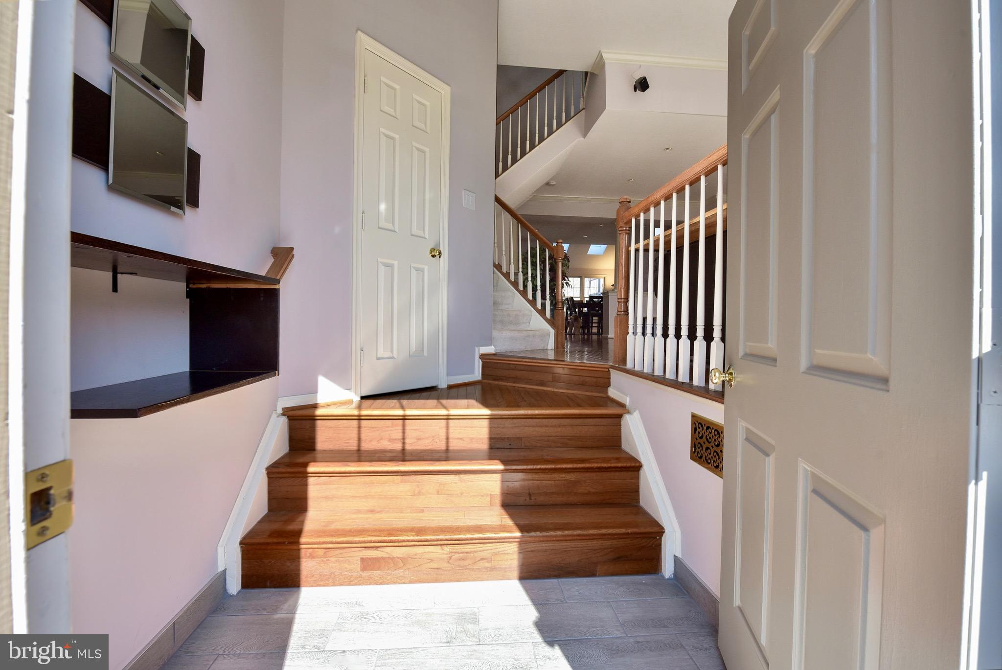 20320 Burnley Square Sterling, VA 20165 - Photo 37 of 37 Enter into the open floor plan of the main level