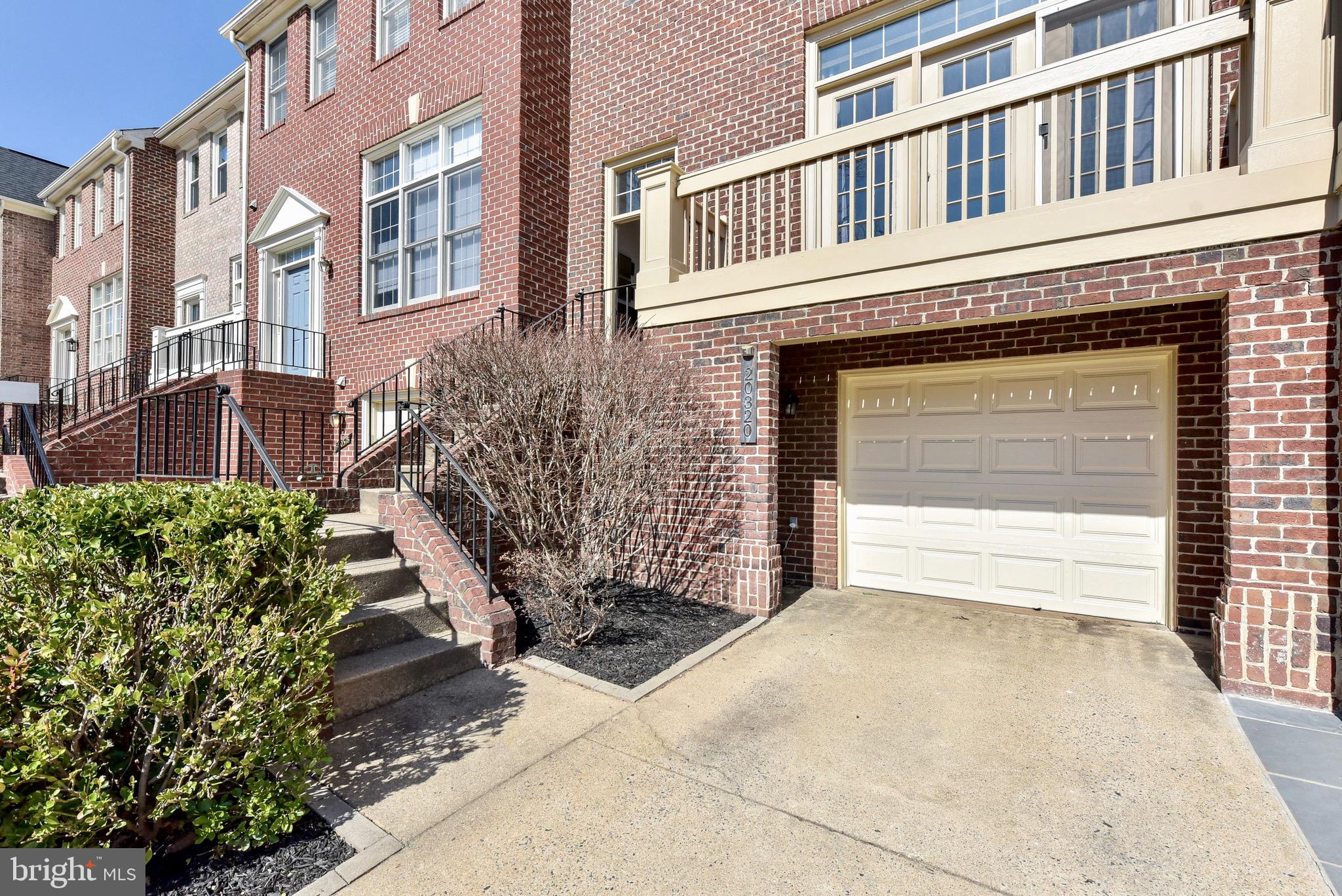 20320 Burnley Square Sterling, VA 20165 - Photo 31 of 37 Garage & driveway provide 2 private parking spots