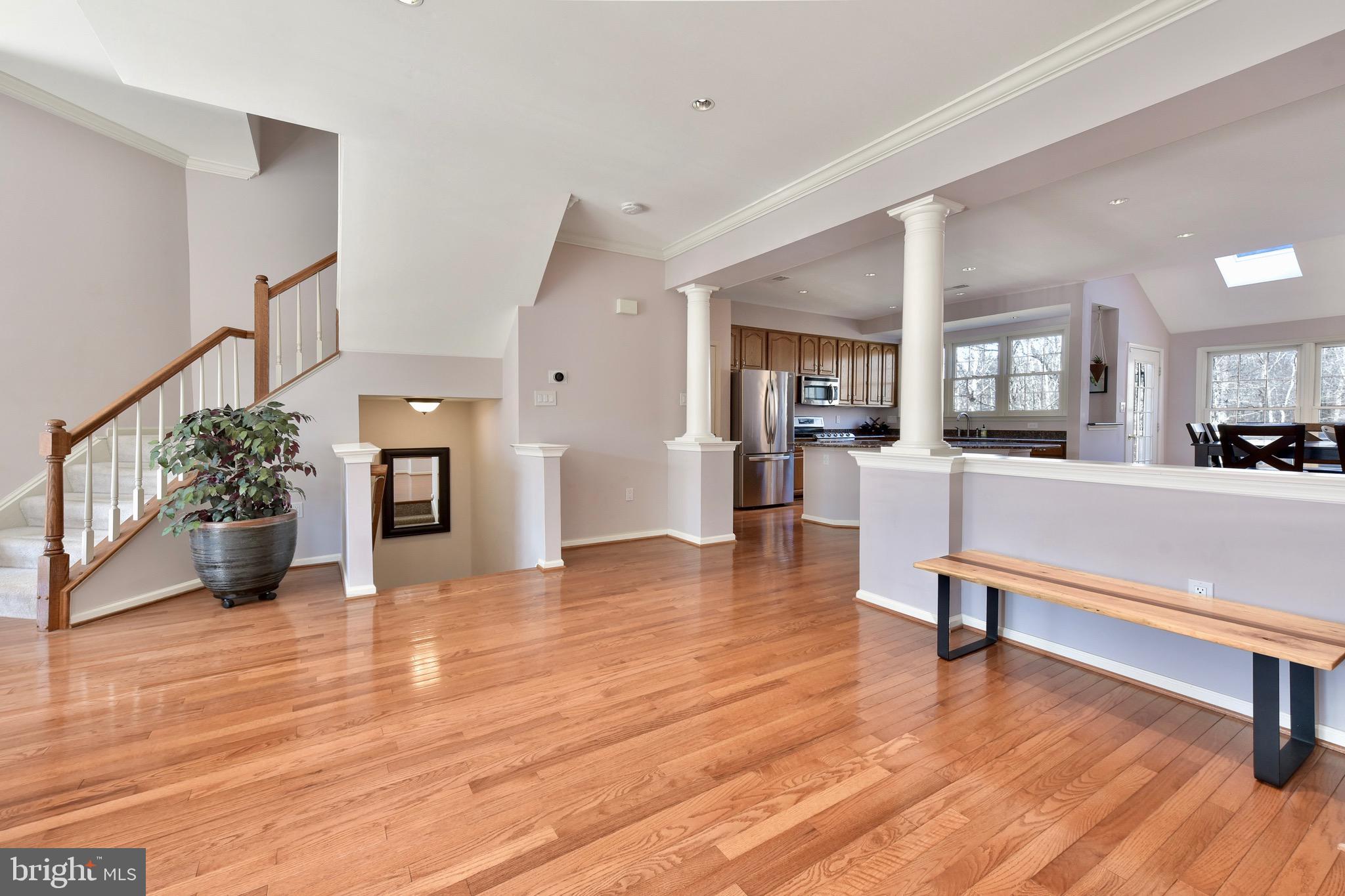 20320 Burnley Square Sterling, VA 20165 - Photo 3 of 37 Gleaming hardwood flooring on main level