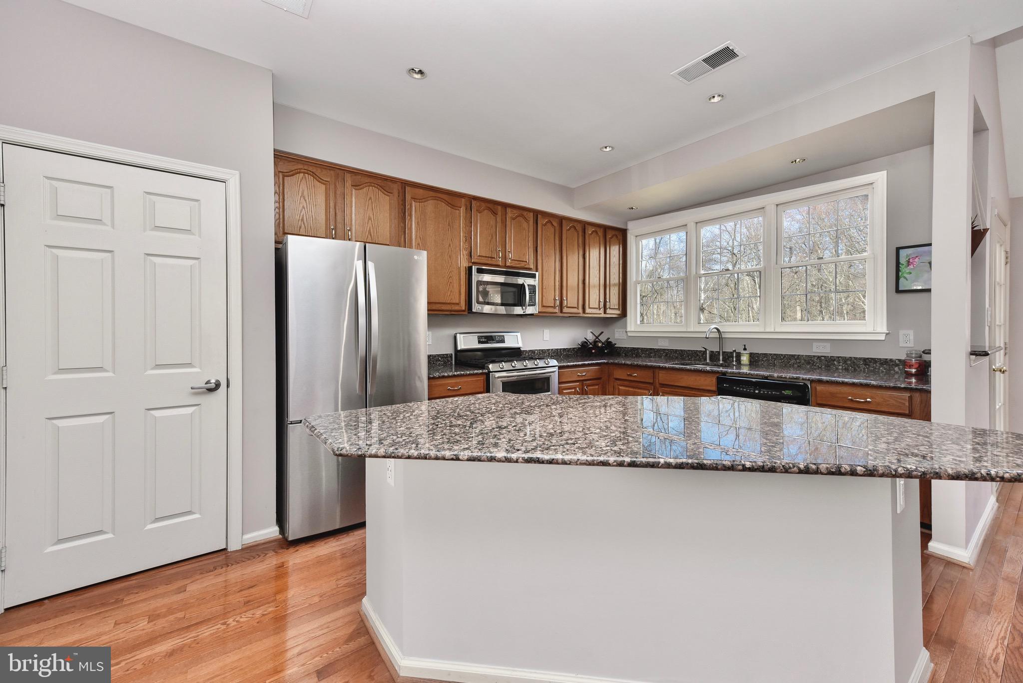 20320 Burnley Square Sterling, VA 20165 - Photo 6 of 37 Gourmet kitchen includes huge island & a pantry