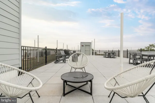 a view of a swimming pool with a terrace