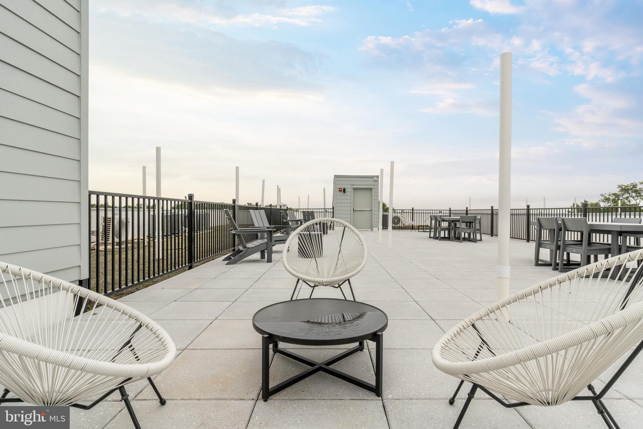 a view of a swimming pool with a terrace