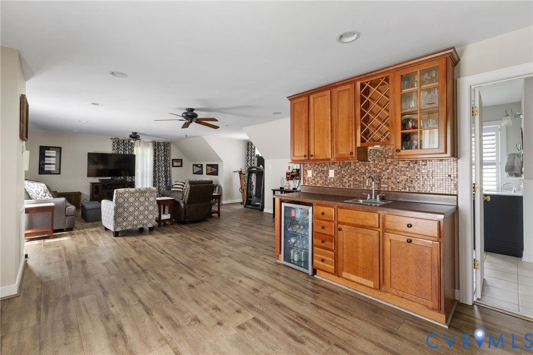 748 Factory Mill Road Bumpass, VA 23024 - Photo 26 of 44 a living room with furniture and large windows