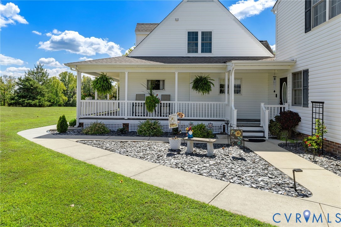 748 Factory Mill Road Bumpass, VA 23024 - Photo 35 of 44 a front view of a house with garden