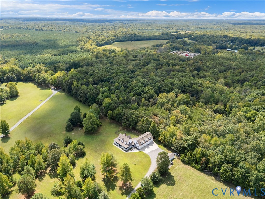 748 Factory Mill Road Bumpass, VA 23024 - Photo 37 of 44 a view of a lake with a mountain