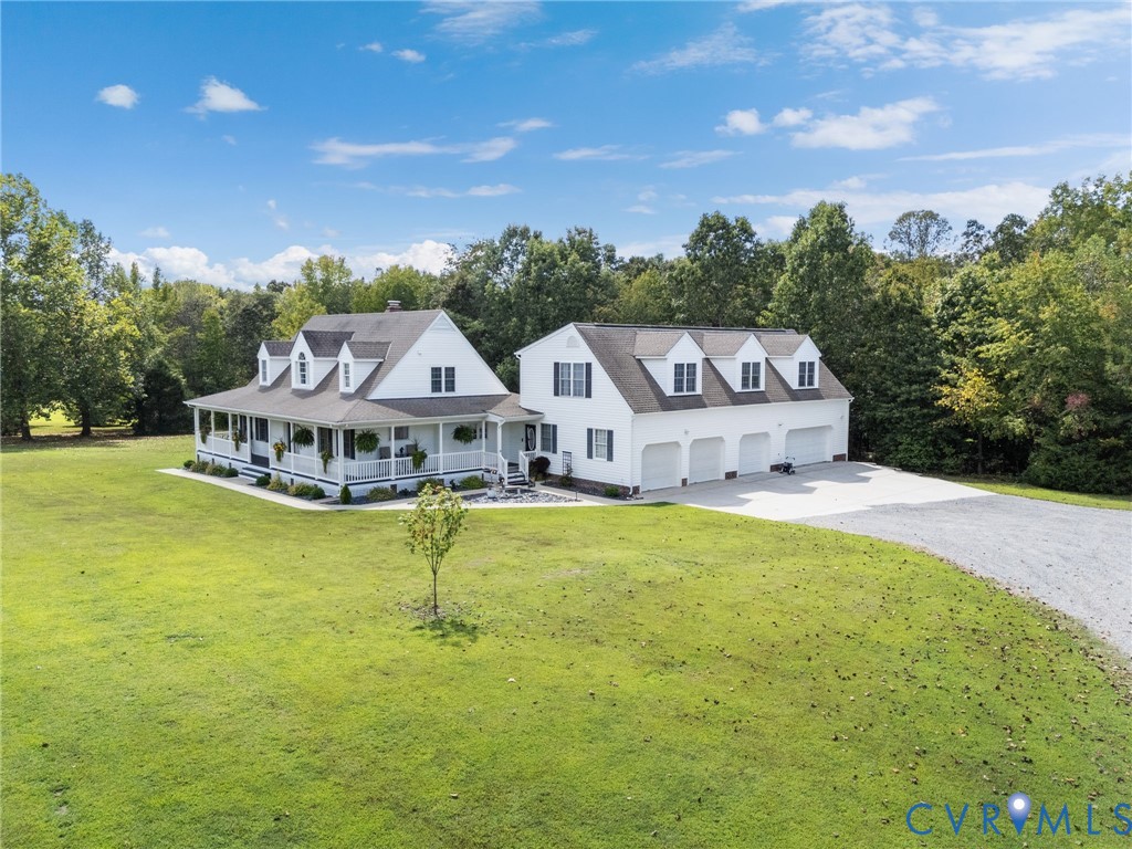 748 Factory Mill Road Bumpass, VA 23024 - Photo 38 of 44 a view of a house with a big yard and large trees