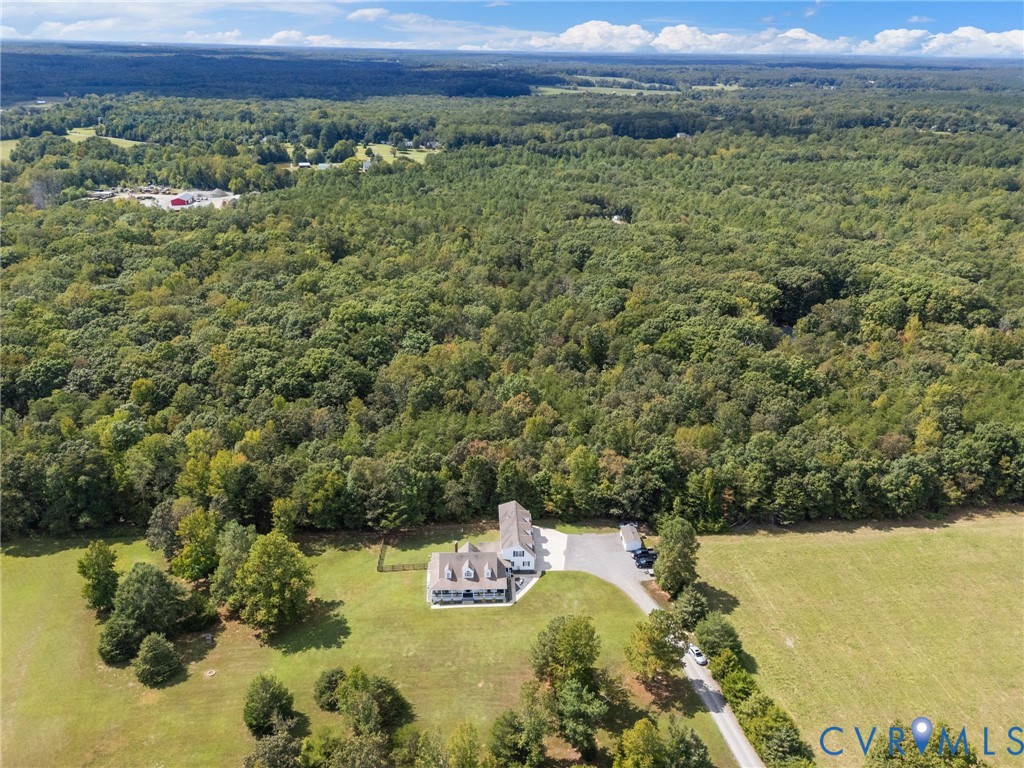 748 Factory Mill Road Bumpass, VA 23024 - Photo 39 of 44 a view of a lush green field