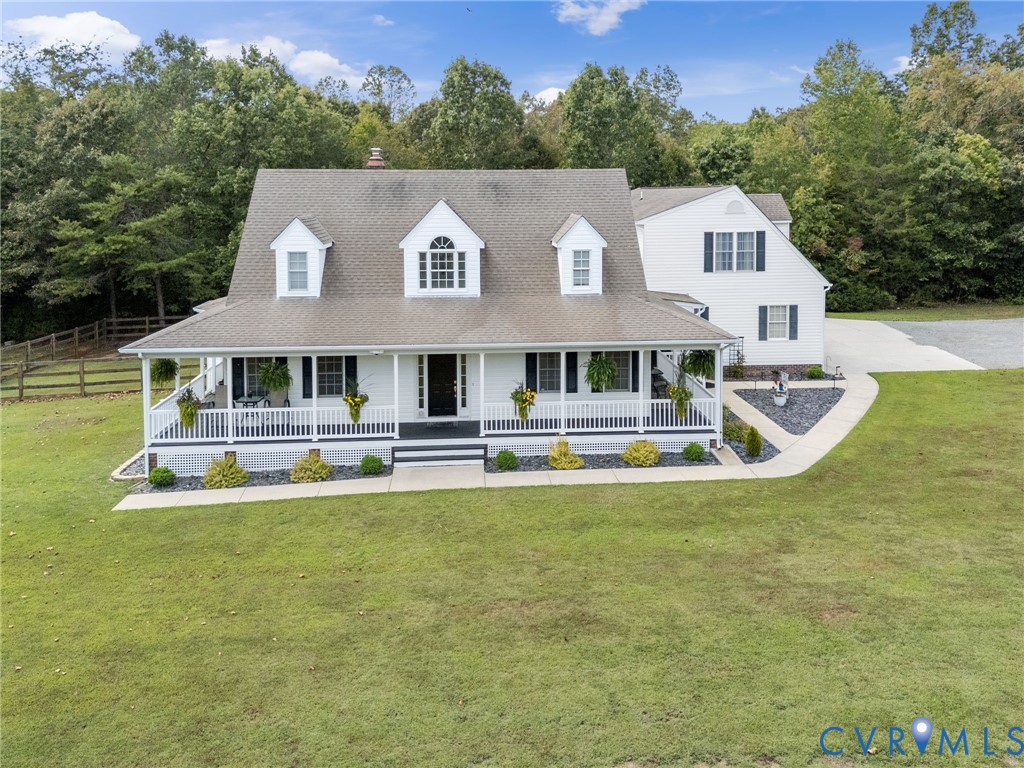 748 Factory Mill Road Bumpass, VA 23024 - Photo 41 of 44 a view of house with swimming pool