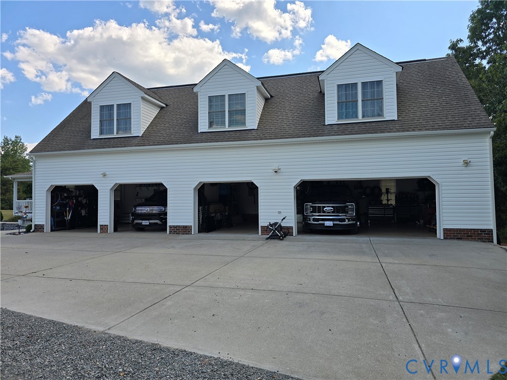 748 Factory Mill Road Bumpass, VA 23024 - Photo 42 of 44 a view of a couches and a fireplace in the patio