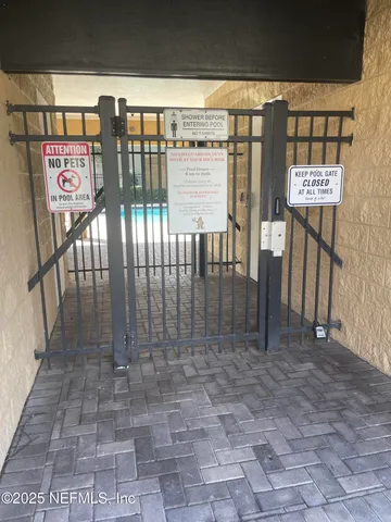 a view of a room with racks on the wall