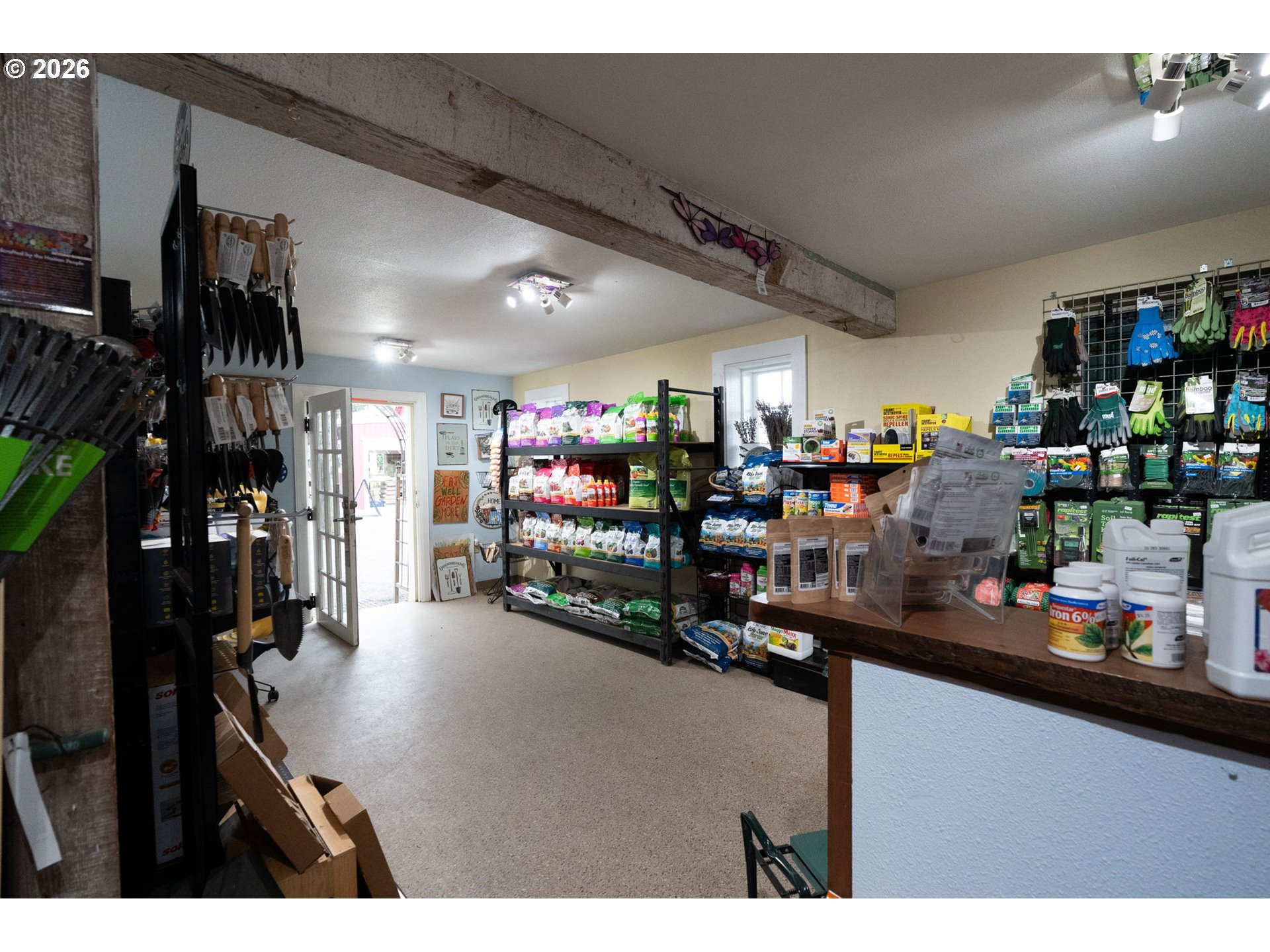 7601 Milne Road Cornelius, OR 97113 - Photo 26 of 48 a room with lots of bottles of alcohol
