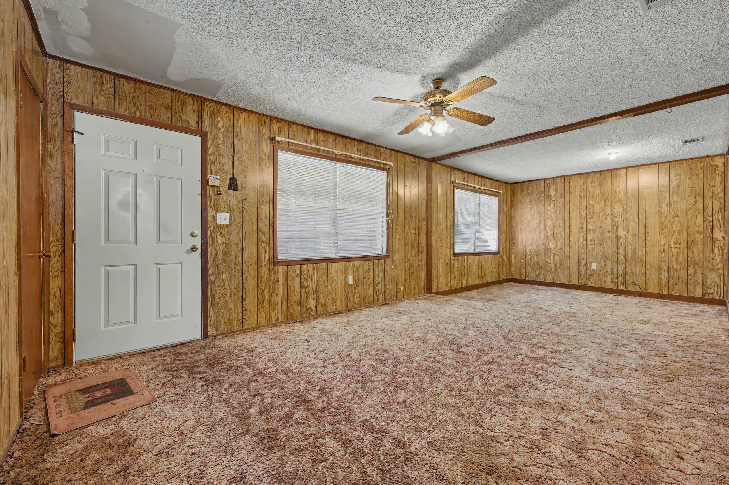 1208 Sunshine Drive Crestview, FL 32539 - Photo 14 of 38 a view of an empty room with a window