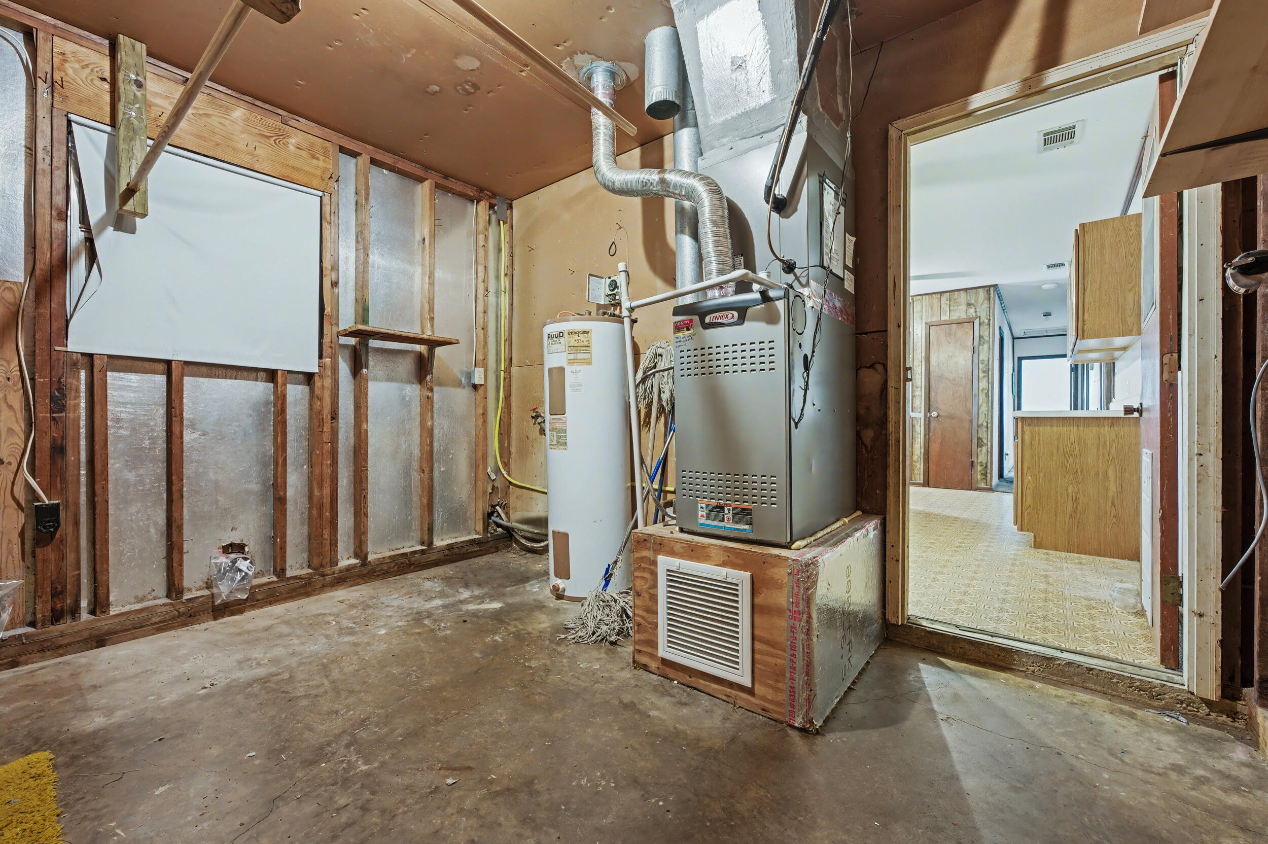 1208 Sunshine Drive Crestview, FL 32539 - Photo 31 of 38 a view of a refrigerator in an empty room