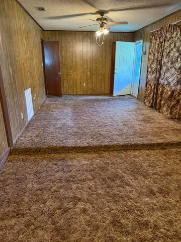 a view of a livingroom with a staircase
