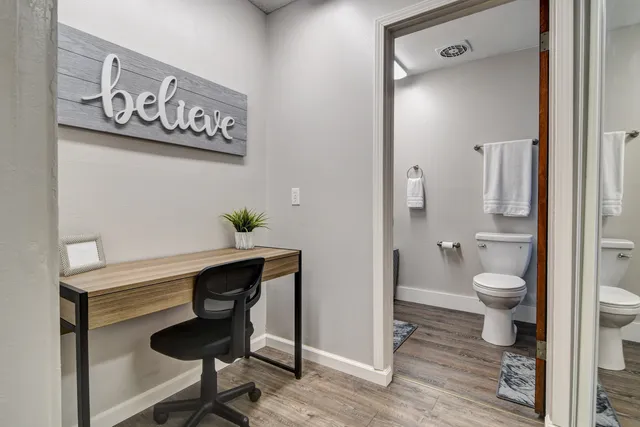 a view of bathroom with a toilet