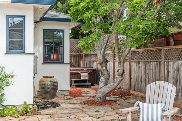 a backyard of a house with seating space