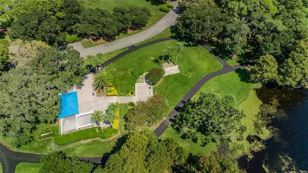 a house view with a sitting space and garden