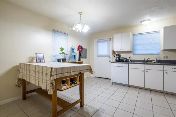 a kitchen that has a cabinets counter space and appliances
