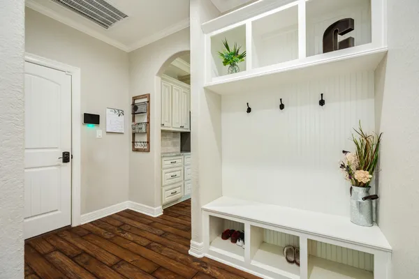 a bathroom with a sink vanity and a mirror