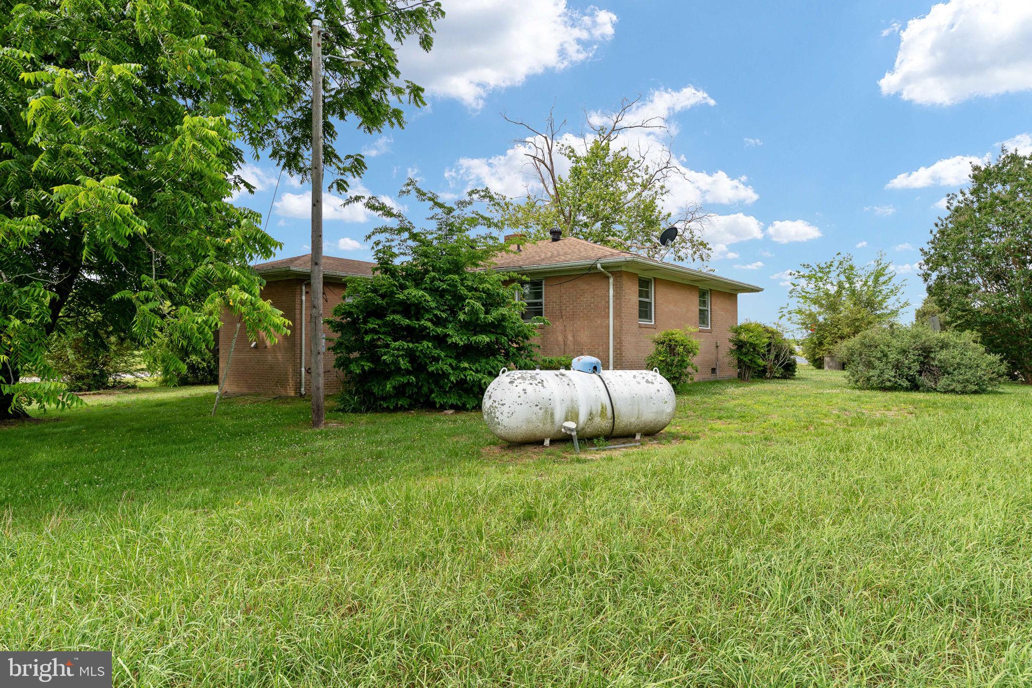 1440 Holly Farm Road Burkeville, VA 23922 - Photo 47 of 52 Charming home with lush greenery.