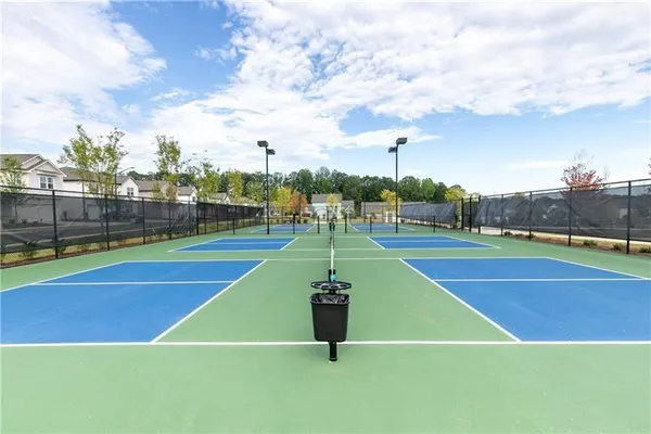 a tennis court that has tennis net