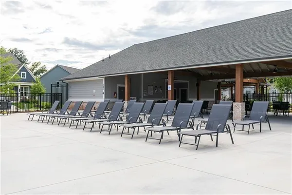 a view of swimming pool with a yard