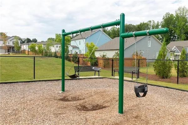 a view of a swimming pool with a lounge chairs