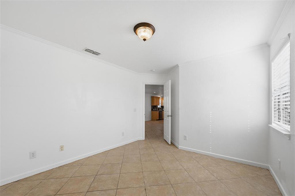 633 Rose Garden Drive, Unit 2 McKinney, TX 75072 - Photo 12 of 17 a view of an empty room