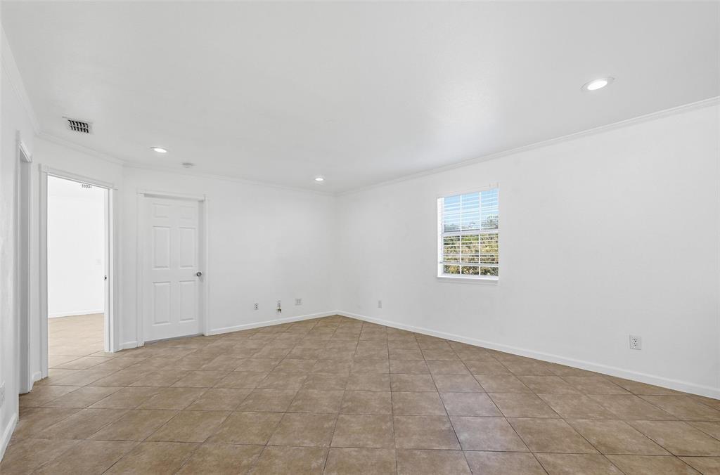 633 Rose Garden Drive, Unit 2 McKinney, TX 75072 - Photo 7 of 17 a view of an empty room