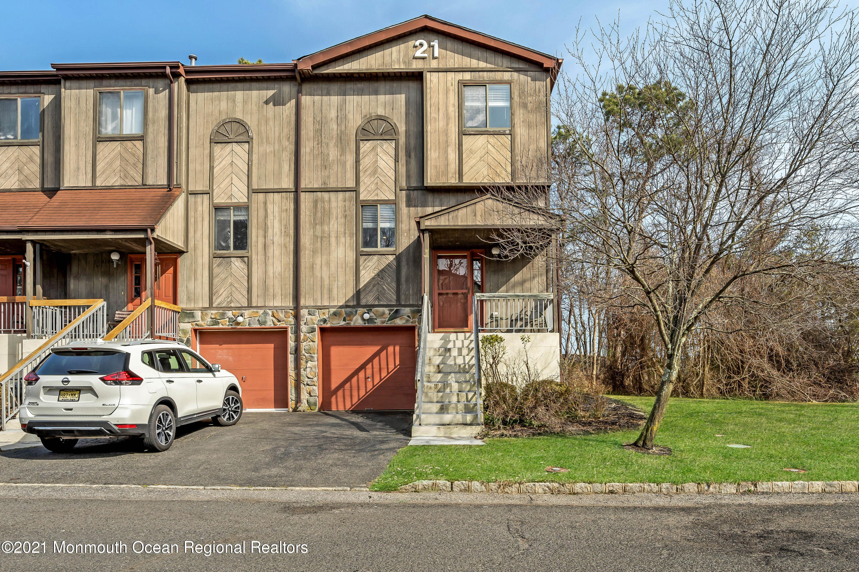 2101 Alpine Trail Neptune Township, NJ 07753 - Photo 2 of 24 a car parked in front of a house