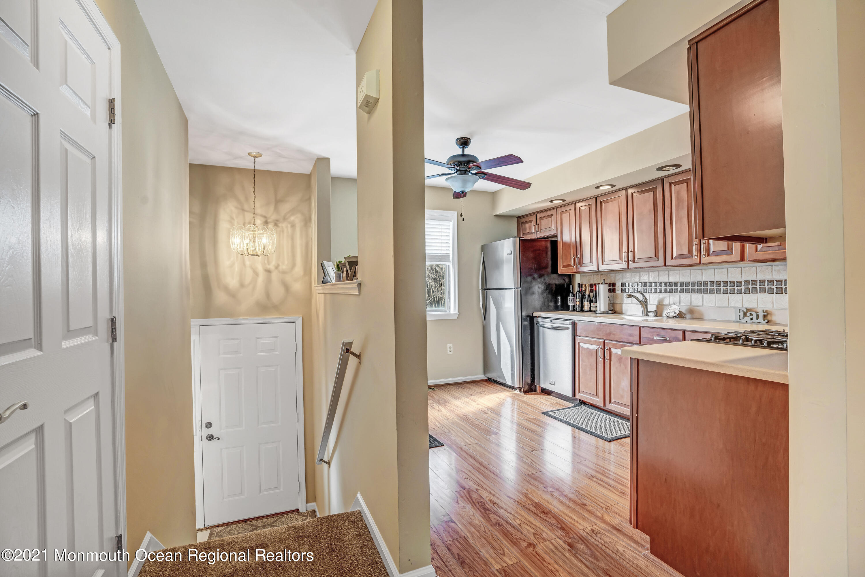 2101 Alpine Trail Neptune Township, NJ 07753 - Photo 15 of 24 a kitchen with stainless steel appliances granite countertop a refrigerator and a stove top oven
