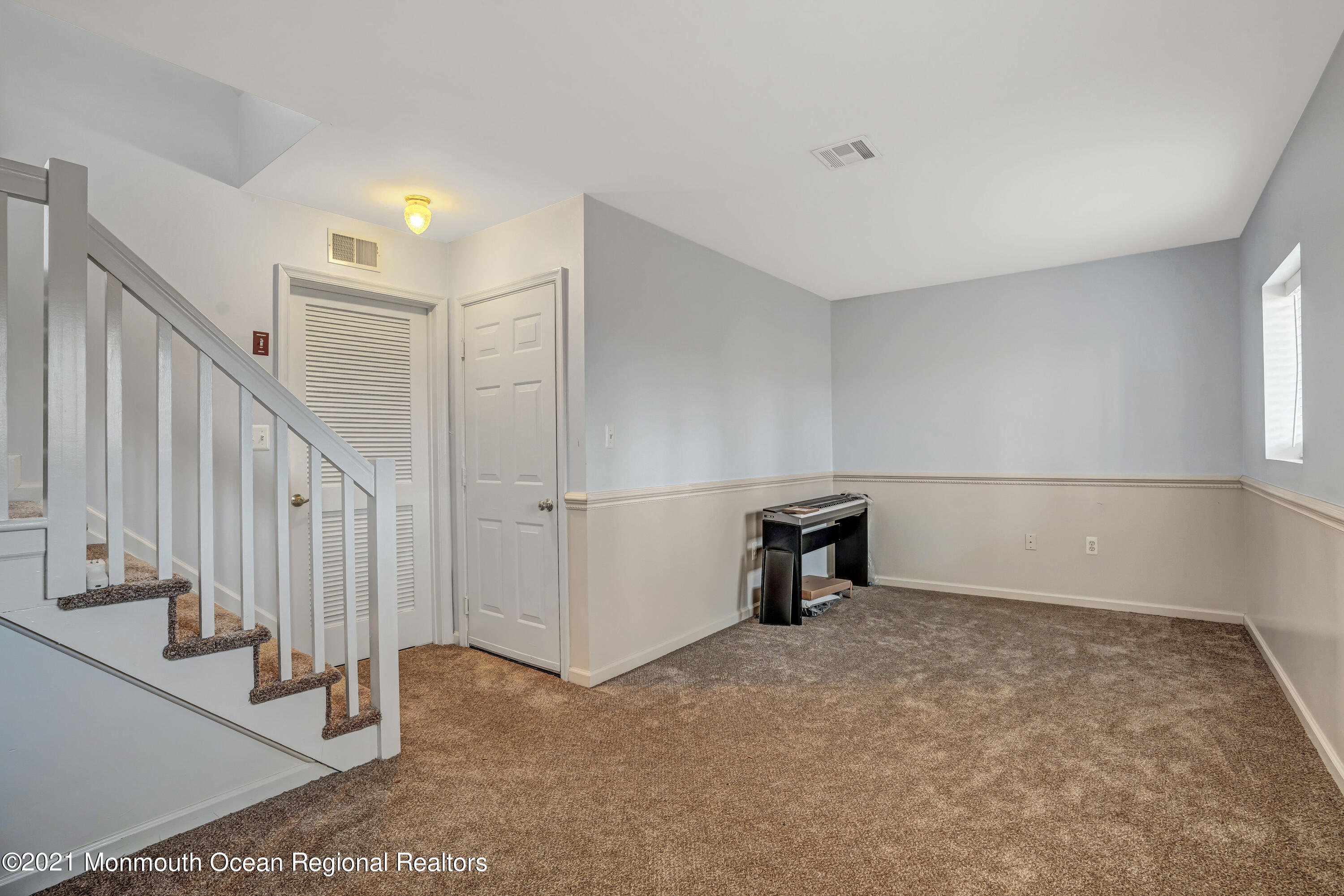 2101 Alpine Trail Neptune Township, NJ 07753 - Photo 16 of 24 a view of an empty room with stairs