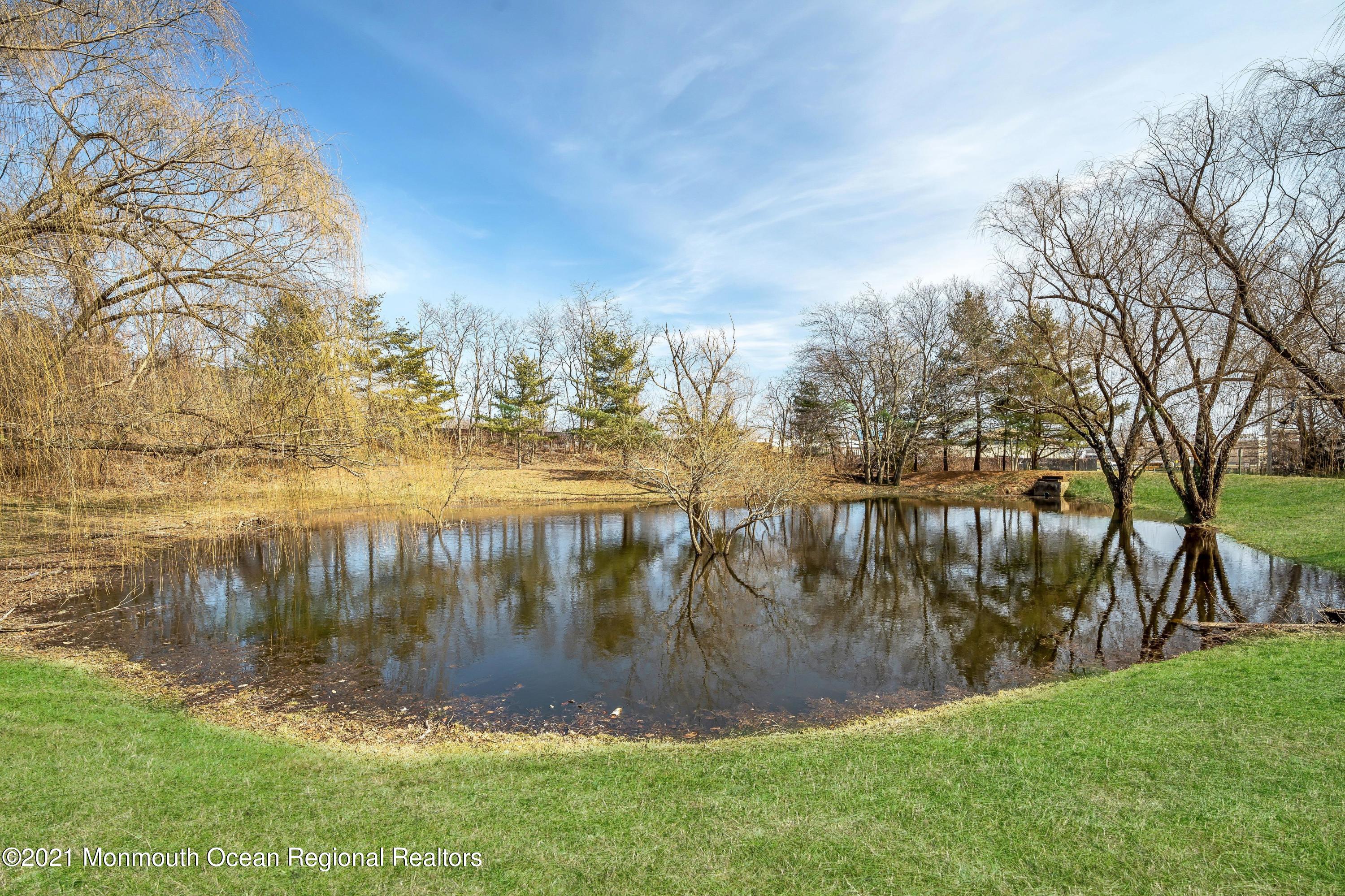 2101 Alpine Trail Neptune Township, NJ 07753 - Photo 18 of 24 a view of lake from a yard