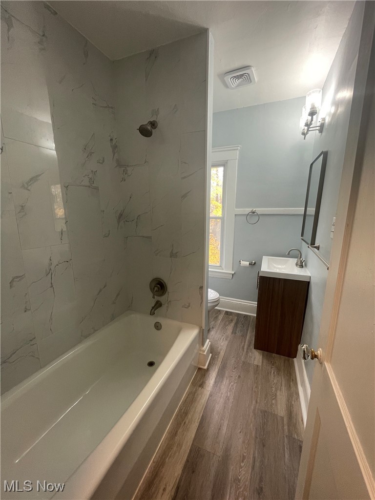 3235 Oak Road Cleveland, OH 44118 - Photo 19 of 47 Full bathroom renovated with LTV flooring surround and vanity and toilet