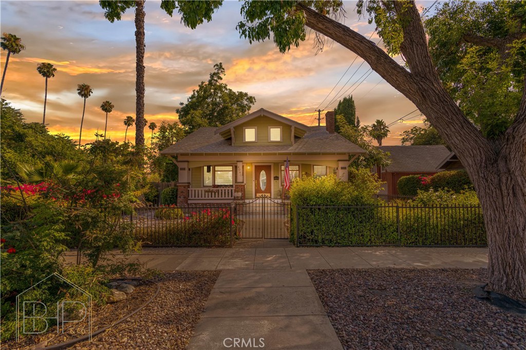 4040 3rd Street Riverside, CA 92501 - Photo 1 of 1 a front view of a house with a yard