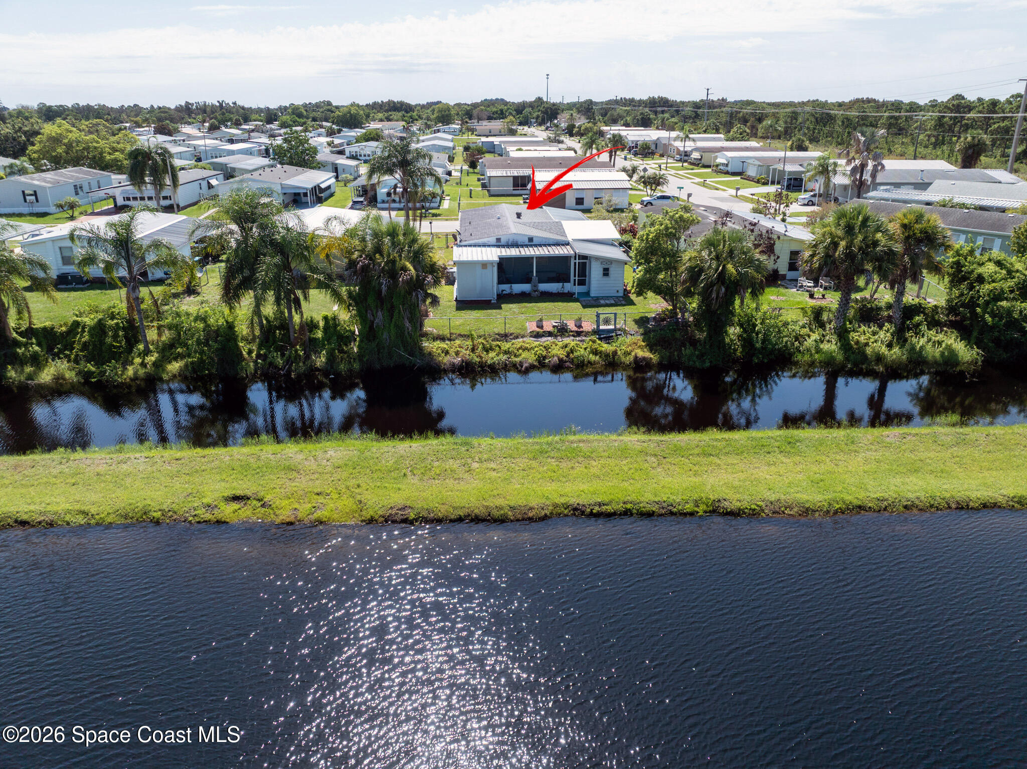 1724 Mango Street Northeast Palm Bay, FL 32905 - Photo 3 of 48 DJI_0506 copy