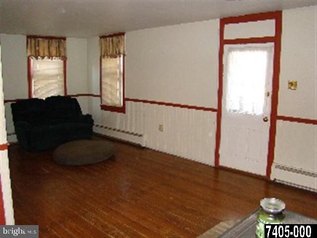 810 White Oak Road Windsor, PA 17366 - Photo 3 of 12 a living room with furniture and a window