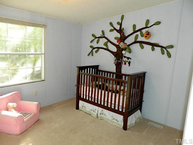 2028 Carpenter Pond Road Raleigh, NC 27613 - Photo 17 of 23 a view of front door