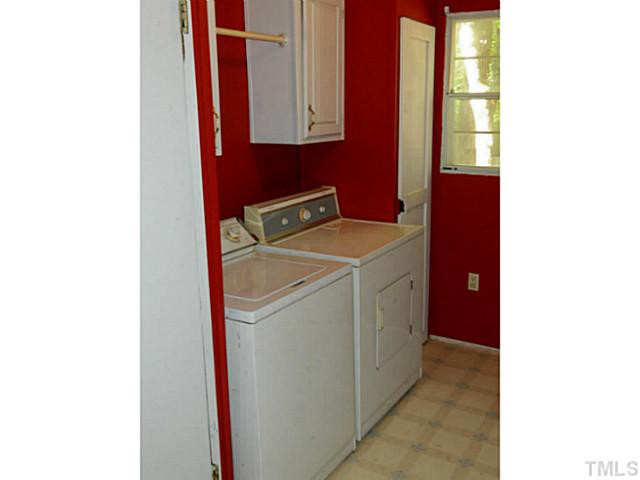 2028 Carpenter Pond Road Raleigh, NC 27613 - Photo 23 of 23 a utility room with dryer and washer