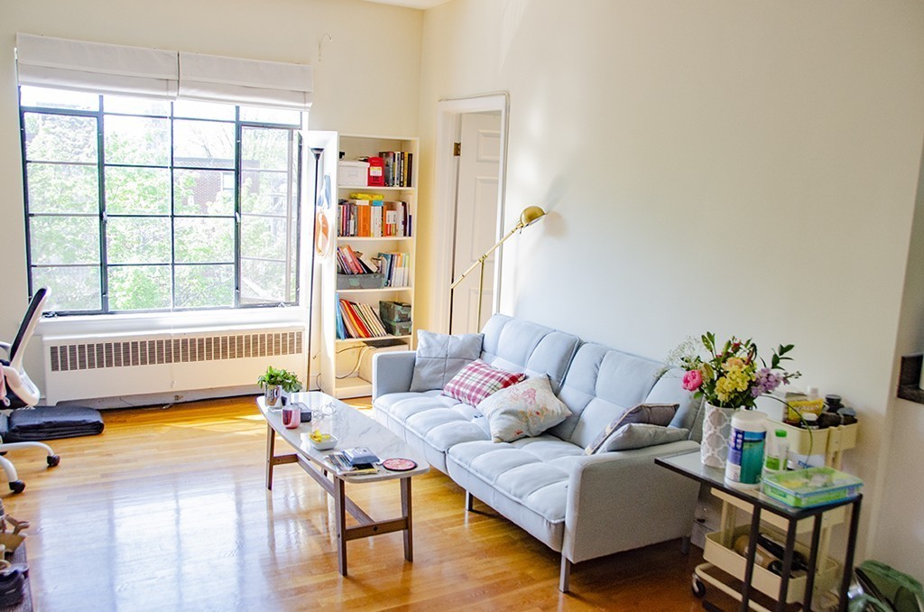 15 Ellery Street, Unit 11 Cambridge, MA 02138 - Photo 3 of 10 a living room with furniture and a window
