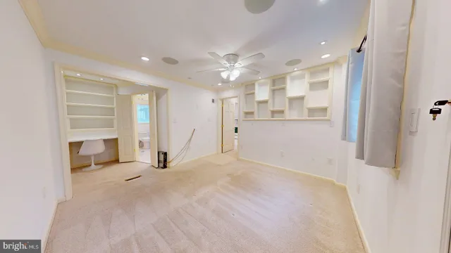 a view of a livingroom with a staircase