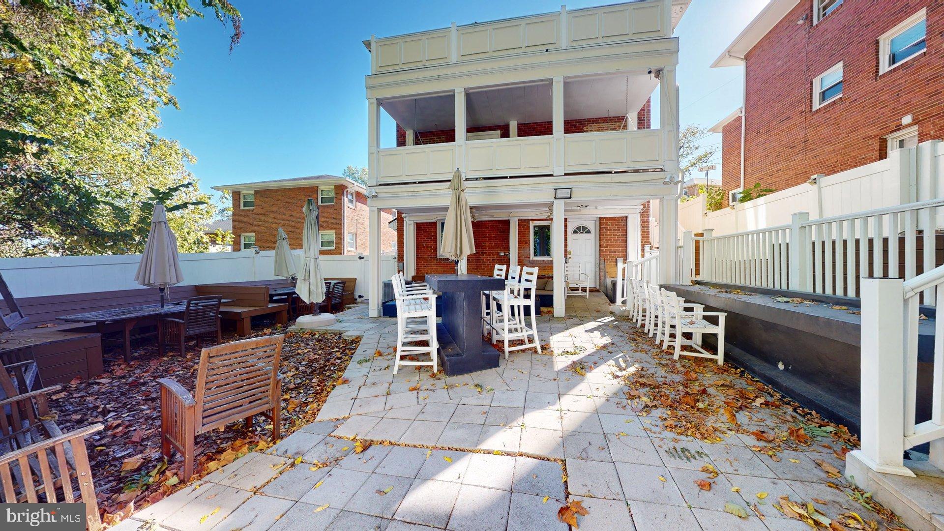 4145 21st Road North, Unit B Arlington, VA 22207 - Photo 25 of 29 a view of a dinning table and a couch in the patio