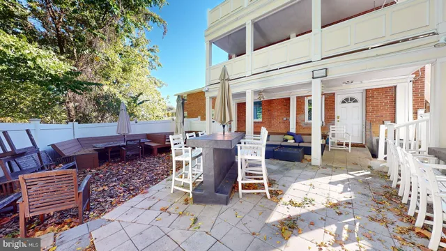 a view of outdoor dining space with a patio